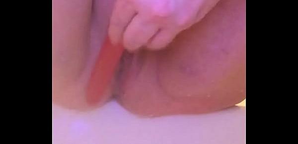  Pissing on dildo and into bathtub